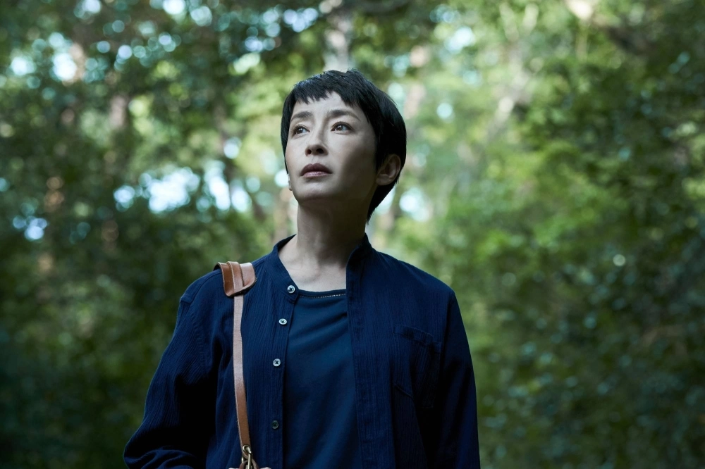 A struggling novelist (Rie Miyazawa) wrestles with life’s bigger questions after taking a job at a care facility for people with severe disabilities in “The Moon.” A struggling novelist (Rie Miyazawa) wrestles with life’s bigger questions after taking a job at a care facility for people with severe disabilities in “The Moon.”