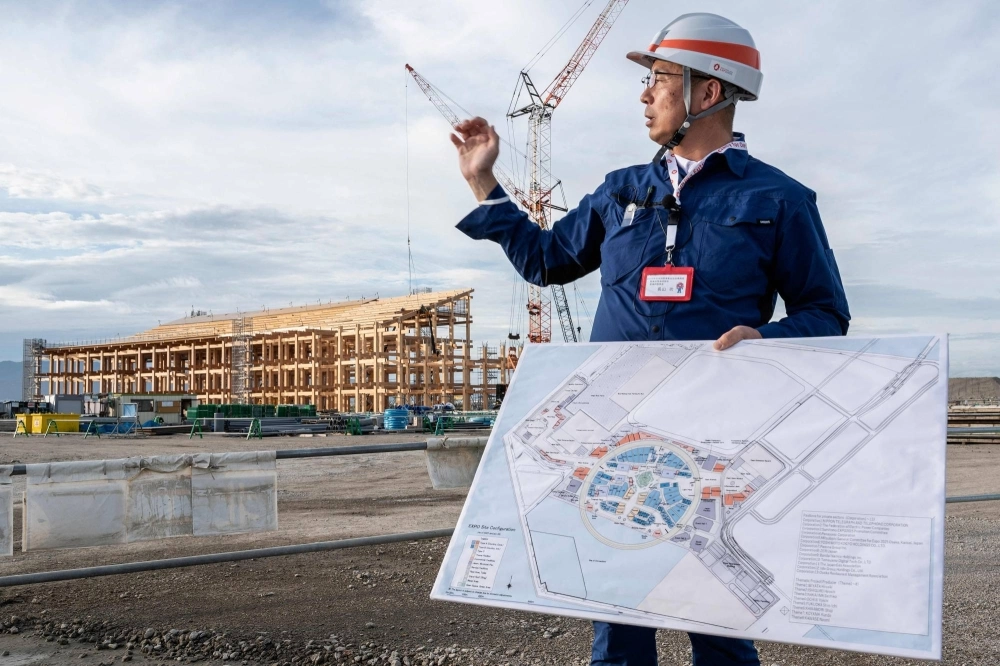 An official speaks during a government-sponsored tour of the 2025 Osaka Expo site on Yumeshima island, Osaka, on Sept. 14. An official speaks during a government-sponsored tour of the 2025 Osaka Expo site on Yumeshima island, Osaka, on Sept. 14.