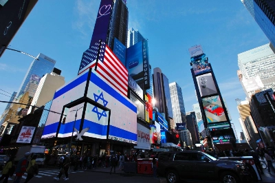 A screen displays the Israeli flag in New York's Times Square on Friday. A screen displays the Israeli flag in New York's Times Square on Friday.