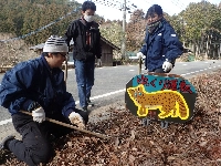A sign made by children on Tsushima island to warn motorists to watch out for Tsushima leopard cats. The cats’ preference for the diverse food sources on offer in cities and towns puts them in close proximity to one of their biggest killers: cars.  | Tsushima Wildlife Conservation Center