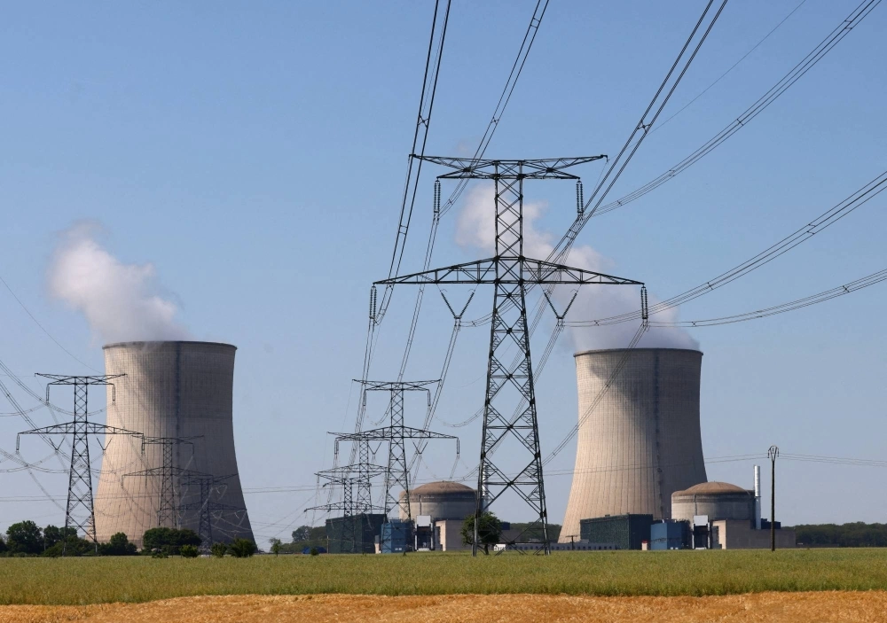 Cooling towers and reactors at a nuclear power plant in Cattenom, France Cooling towers and reactors at a nuclear power plant in Cattenom, France
