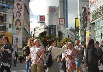Foreign tourists in Tokyo's Shibuya Ward on Wednesday Foreign tourists in Tokyo's Shibuya Ward on Wednesday