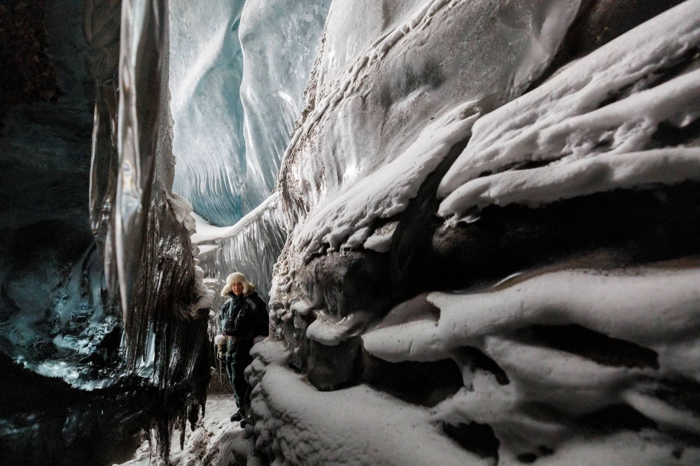 Ice walls inside a glacier cave in Svalbard, Norway Ice walls inside a glacier cave in Svalbard, Norway