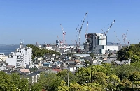 JERA's coal-fired power plant in Yokosuka, Kanagawa Prefecture, is under construction in 2021. | Annelise Giseburt