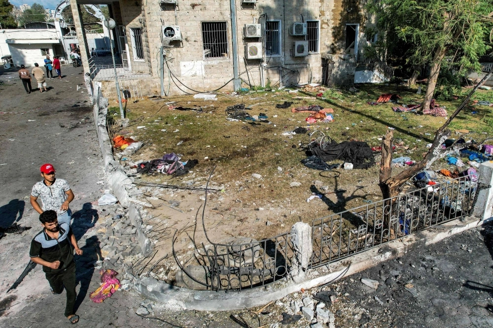 The site of the al-Ahli Arab Hospital after a blast ripped through the facility on Tuesday. The site of the al-Ahli Arab Hospital after a blast ripped through the facility on Tuesday.