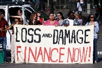 Environmental activists on the sidelines of the New Global Financial Pact Summit in Paris on June 23 | REUTERS