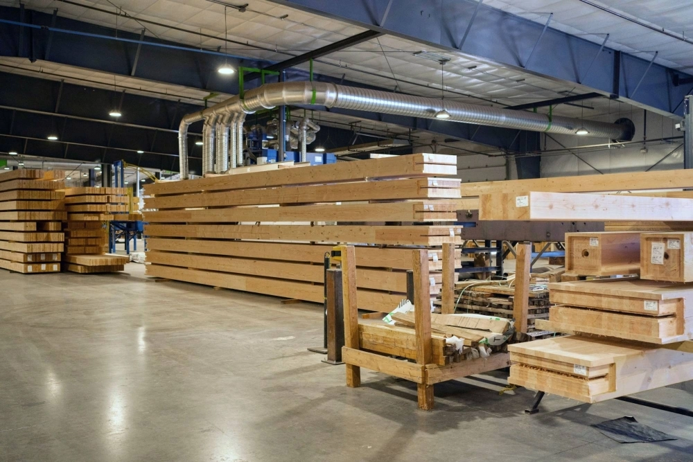 After the boards are pressed, the adhesive has cured and the glulam beams are precision-cut, they’re ready to be shipped to a construction site.  After the boards are pressed, the adhesive has cured and the glulam beams are precision-cut, they’re ready to be shipped to a construction site.