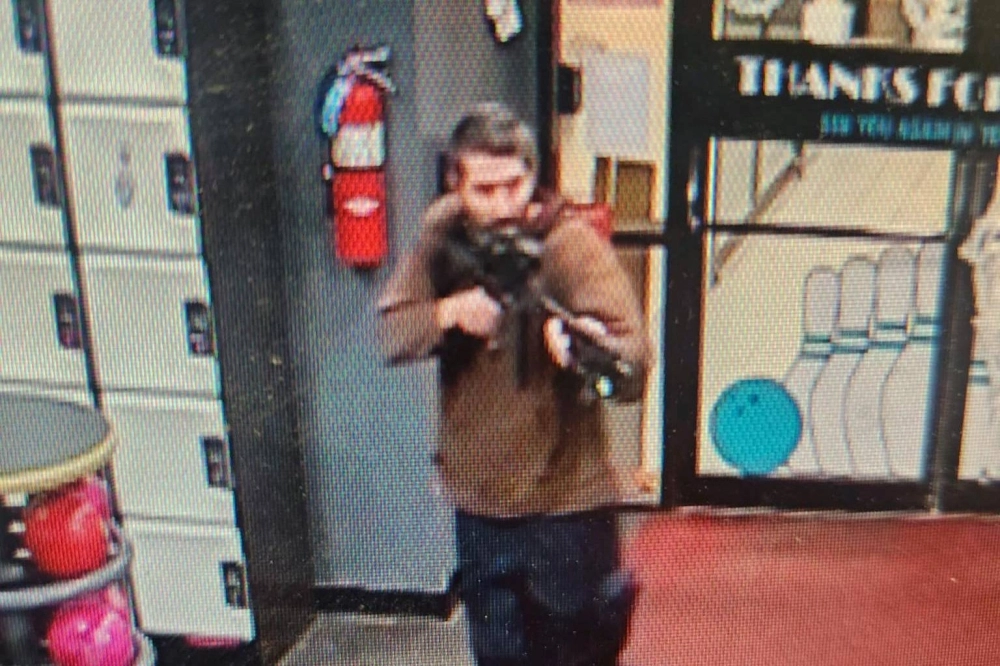 The armed suspect in a shooting in Lewiston, Maine, on Wednesday. At least 22 people have been reported killed and dozens injured in the city, U.S. media has reported, citing police. The armed suspect in a shooting in Lewiston, Maine, on Wednesday. At least 22 people have been reported killed and dozens injured in the city, U.S. media has reported, citing police.