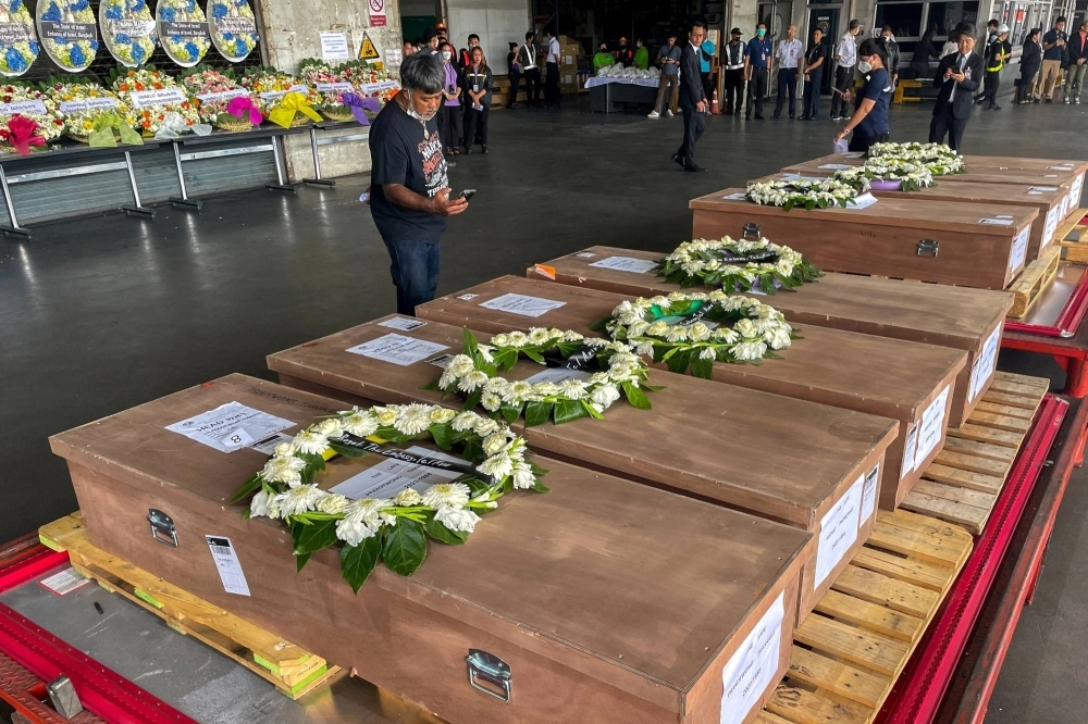 Coffins carrying bodies of Thai migrant agricultural workers who were killed in an attack by the Palestinian militant group Hamas on Israel, arrive at Bangkok's Suvarnabhumi Airport, Thailand, on Oct. 20 Coffins carrying bodies of Thai migrant agricultural workers who were killed in an attack by the Palestinian militant group Hamas on Israel, arrive at Bangkok's Suvarnabhumi Airport, Thailand, on Oct. 20