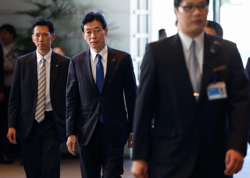 Economy minister Yasutoshi Nishimura (center) is right to insist that economic security is linked to national power and determines the fate of the nation. REUTERS Economy minister Yasutoshi Nishimura (center) is right to insist that economic security is linked to national power and determines the fate of the nation. REUTERS