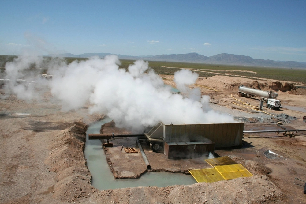 Steam escapes from a well at Raser Technologies' geothermal plant near Minersville, Utah. In April, the U.S. Department of Energy announced the first-ever backing for 11 community geothermal projects in 10 states, while several states have passed new laws to boost the strategy. Steam escapes from a well at Raser Technologies' geothermal plant near Minersville, Utah. In April, the U.S. Department of Energy announced the first-ever backing for 11 community geothermal projects in 10 states, while several states have passed new laws to boost the strategy.