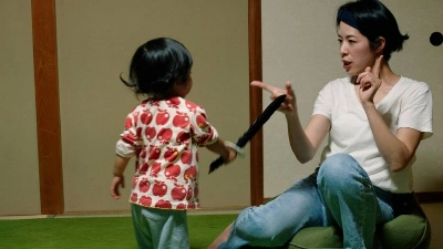 "The Ones Left Behind" documents the successes and struggles of single mothers in Japan. "The Ones Left Behind" documents the successes and struggles of single mothers in Japan.