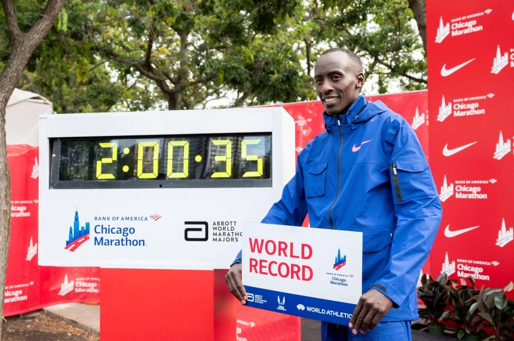 Kelvin Kiptum of Kenya celebrates after finishing in a world record time of 2:00:35 to win the Chicago Marathon on Oct. 8. Kelvin Kiptum of Kenya celebrates after finishing in a world record time of 2:00:35 to win the Chicago Marathon on Oct. 8.