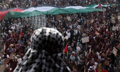 Demonstrators gather in Freedom Plaza during a rally in support of Palestinians in Washington on Friday. Demonstrators gather in Freedom Plaza during a rally in support of Palestinians in Washington on Friday.
