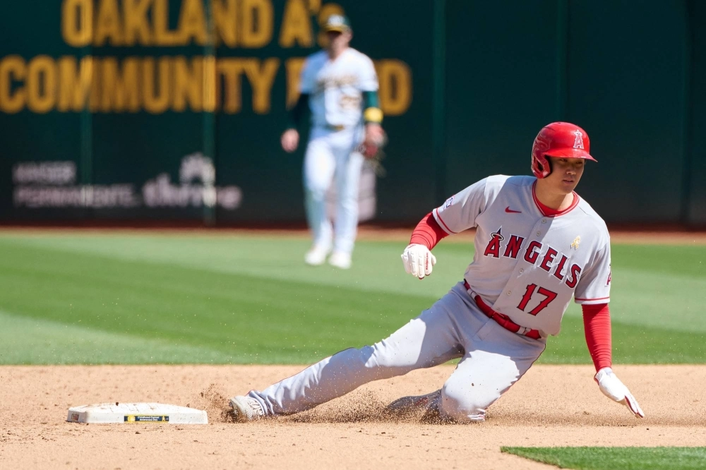 Los Angeles Angels designated hitter Shohei Ohtani steals second base against the Oakland Athletics during the fifth inning at Oakland-Alameda County Coliseum in Oakland, California, on Sept. 3. Los Angeles Angels designated hitter Shohei Ohtani steals second base against the Oakland Athletics during the fifth inning at Oakland-Alameda County Coliseum in Oakland, California, on Sept. 3.