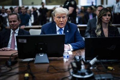 Former U.S. President Donald Trump sits in the courtroom during his civil fraud trial at New York State Supreme Court on Monday. Former U.S. President Donald Trump sits in the courtroom during his civil fraud trial at New York State Supreme Court on Monday.