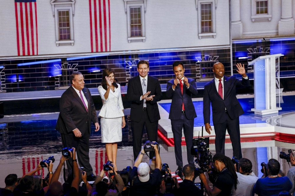 Former Gov. Chris Christie of New Jersey, former Gov. Nikki Haley of South Carolina, Gov. Ron Desantis of Florida, entrepreneur Vivek Ramaswamy, and Sen. Tim Scott, take the stage for the third Republican presidential debate in Miami on Wednesday.  Former Gov. Chris Christie of New Jersey, former Gov. Nikki Haley of South Carolina, Gov. Ron Desantis of Florida, entrepreneur Vivek Ramaswamy, and Sen. Tim Scott, take the stage for the third Republican presidential debate in Miami on Wednesday.