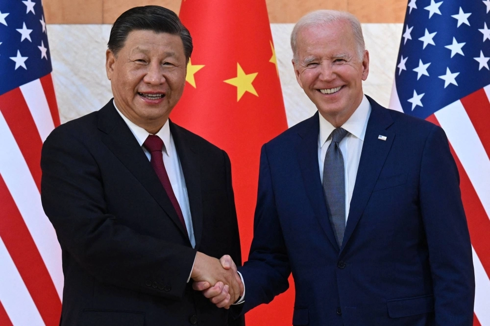 U.S. President Joe Biden and Chinese President Xi Jinping shake hands as they meet on the sidelines of the G20 Summit in Nusa Dua on the Indonesian resort island of Bali on Nov. 14, 2022. U.S. President Joe Biden and Chinese President Xi Jinping shake hands as they meet on the sidelines of the G20 Summit in Nusa Dua on the Indonesian resort island of Bali on Nov. 14, 2022.