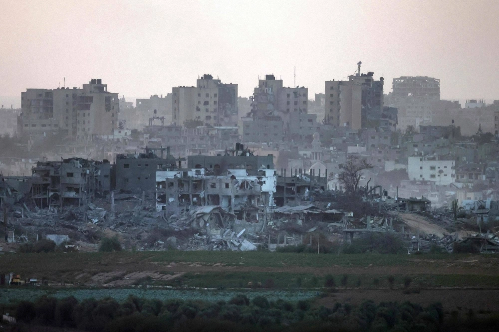 Destroyed buildings in Gaza on Thursday amid ongoing battles between Israeli forces and the Hamas militant group. Destroyed buildings in Gaza on Thursday amid ongoing battles between Israeli forces and the Hamas militant group.