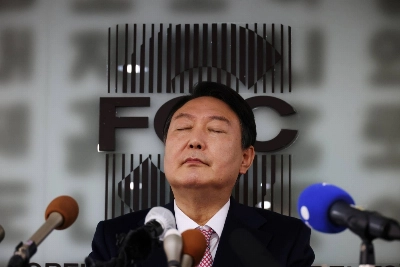 Yoon Suk-yeol, then the 2022 presidential election candidate of South Korea's main opposition People Power Party, attends a news conference in Seoul in November 2021.    Yoon Suk-yeol, then the 2022 presidential election candidate of South Korea's main opposition People Power Party, attends a news conference in Seoul in November 2021.