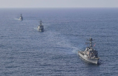 U.S., Japanese and South Korean navy destroyers take part in joint missile defense exercises in international waters between South Korea and Japan in April.  U.S., Japanese and South Korean navy destroyers take part in joint missile defense exercises in international waters between South Korea and Japan in April.