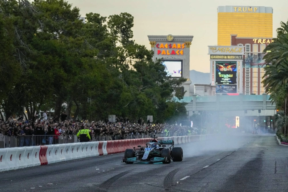 Mercedes driver George Russell drives during the Formula One Las Vegas Grand Prix Launch Party in November 2022.  Mercedes driver George Russell drives during the Formula One Las Vegas Grand Prix Launch Party in November 2022.