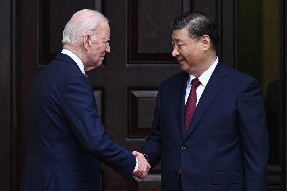 U.S. President Joe Biden greets Chinese President Xi Jinping before a meeting during the Asia-Pacific Economic Cooperation leaders week in Woodside, California, on Wednesday. U.S. President Joe Biden greets Chinese President Xi Jinping before a meeting during the Asia-Pacific Economic Cooperation leaders week in Woodside, California, on Wednesday.