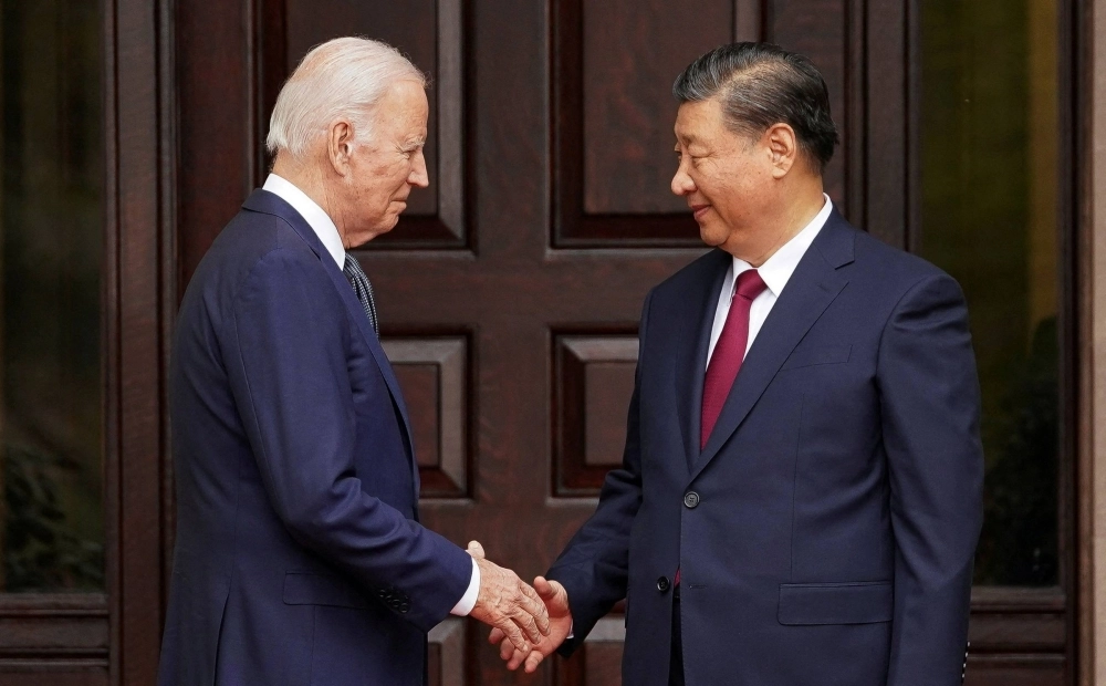 U.S. President Joe Biden greets Chinese President Xi Jinping on the sidelines of an Asia-Pacific Economic Cooperation summit in Woodside, California, on Nov. 15. U.S. President Joe Biden greets Chinese President Xi Jinping on the sidelines of an Asia-Pacific Economic Cooperation summit in Woodside, California, on Nov. 15.