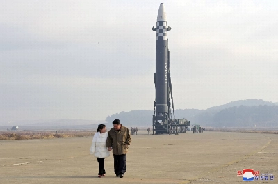 North Korean leader Kim Jong Un, along with his daughter, walks away from an intercontinental ballistic missile in this undated photo released on Nov. 19, 2022  North Korean leader Kim Jong Un, along with his daughter, walks away from an intercontinental ballistic missile in this undated photo released on Nov. 19, 2022