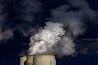 Cooling towers at a coal-fired power plant in Germany. While surface temperatures might stabilize quickly after reaching net-zero, other shifting parts of the climate are harder to slow once set in motion. | Bloomberg