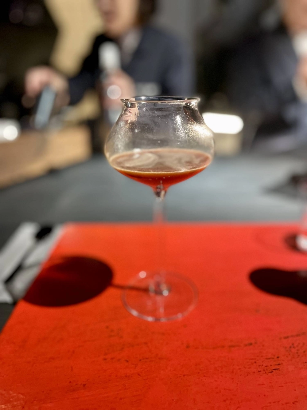 The last course is an espresso-based mocktail made with pomegranate concentrate, hibiscus cold brew and fermented white peach. The last course is an espresso-based mocktail made with pomegranate concentrate, hibiscus cold brew and fermented white peach.