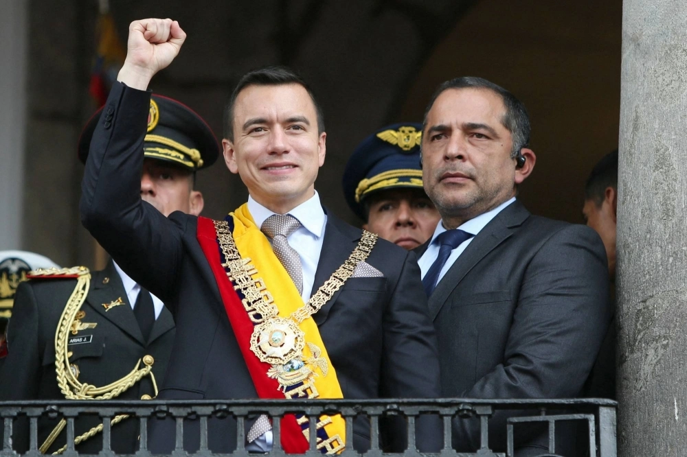 Ecuador's new President Daniel Noboa gestures to the crowd from the balcony of Carondelet Palace after being inaugurated at the National Assembly, in Quito, Ecuador, on Thursday. Ecuador's new President Daniel Noboa gestures to the crowd from the balcony of Carondelet Palace after being inaugurated at the National Assembly, in Quito, Ecuador, on Thursday.