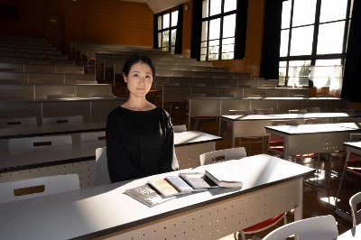 Yoshiko Koide sits in a classroom at Nagoya College where she teaches a Japanese-language observation seminar. Yoshiko Koide sits in a classroom at Nagoya College where she teaches a Japanese-language observation seminar.