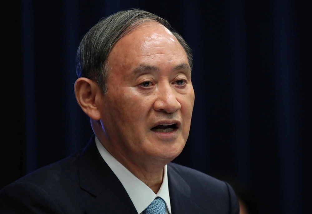 Former Prime Minister Yoshihide Suga says Japanese firms' clean energy technology can speed up the country’s efforts to curb emissions.  Former Prime Minister Yoshihide Suga says Japanese firms' clean energy technology can speed up the country’s efforts to curb emissions.