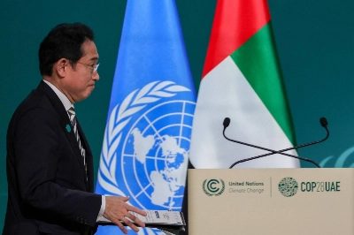 Prime Minister Fumio Kishida prepares to speak at a COP28 session in Dubai on Friday.  Prime Minister Fumio Kishida prepares to speak at a COP28 session in Dubai on Friday.