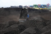 A truck unloads tons of coal inside a warehouse in Tondo, Metro Manila, in 2016. Independent show ample potential for renewables in Japan and Southeast Asia. | Reuters
