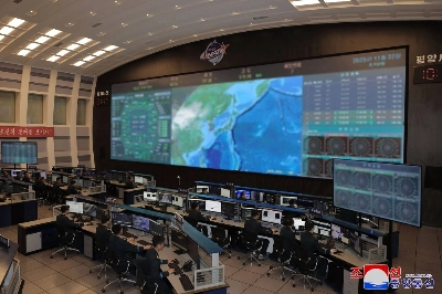 Digitally blurred screens at the Pyongyang General Control Center of the Korean National Aerospace Technology Directorate are seen on Nov. 22, a day after the launch of a rocket carrying a military reconnaissance satellite, in Pyongyang.  Digitally blurred screens at the Pyongyang General Control Center of the Korean National Aerospace Technology Directorate are seen on Nov. 22, a day after the launch of a rocket carrying a military reconnaissance satellite, in Pyongyang.