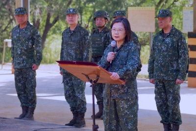 Taiwan President Tsai Ing-wen speaks to compulsory servicemen while inspecting a military base in Taichung on Nov. 23. Tsai is barred by term limits from seeking re-election. Taiwan President Tsai Ing-wen speaks to compulsory servicemen while inspecting a military base in Taichung on Nov. 23. Tsai is barred by term limits from seeking re-election.