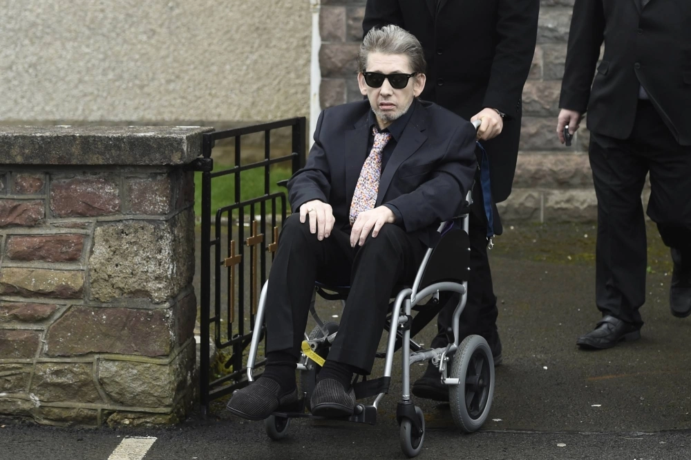The former lead singer of The Pogues, Shane MacGowan, attends the funeral service of his mother in Silvermines, Ireland, in January 2017.  The former lead singer of The Pogues, Shane MacGowan, attends the funeral service of his mother in Silvermines, Ireland, in January 2017.