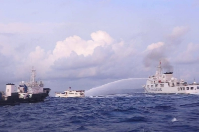 A China Coast Guard vessel fires a water cannon at a Philippine supply boat during a mission to deliver provisions to the Second Thomas Shoal in disputed waters of the South China Sea on Sunday. A China Coast Guard vessel fires a water cannon at a Philippine supply boat during a mission to deliver provisions to the Second Thomas Shoal in disputed waters of the South China Sea on Sunday.