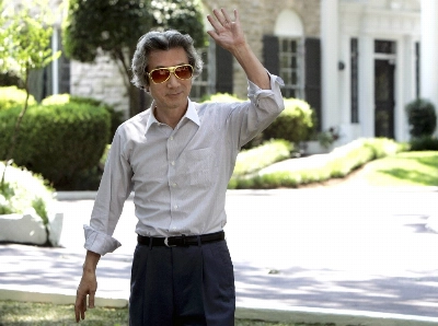 Then-Prime Minister Junichiro Koizumi at Graceland, a mansion once owned by Elvis Presley, in Memphis, Tennessee, in June 2006. Koizumi was dubbed the "jujitsu prime minister” for his style of politics. Then-Prime Minister Junichiro Koizumi at Graceland, a mansion once owned by Elvis Presley, in Memphis, Tennessee, in June 2006. Koizumi was dubbed the "jujitsu prime minister” for his style of politics.