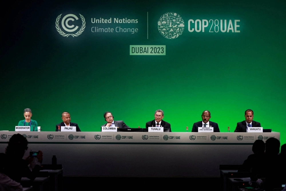 Colombia's President Gustavo Petro, Tuvalu's Prime Minister Kausea Natano, Vanuatu's Climate Minister Ralph Regenvanu, Antigua and Barbuda's Prime Minister Gaston Alphonso Browne, Palau's Minister of Agriculture, Fisheries and Environment Steven Victor, and moderator and political director of the Fossil Fuel Non-Proliferation Treaty Initiative Gillian Cooper attend an event as a group of nation announcing their intention to seek a negotiating mandate for a Fossil Fuel Non-Proliferation Treaty, during COP28 in Dubai on Dec. 2 Colombia's President Gustavo Petro, Tuvalu's Prime Minister Kausea Natano, Vanuatu's Climate Minister Ralph Regenvanu, Antigua and Barbuda's Prime Minister Gaston Alphonso Browne, Palau's Minister of Agriculture, Fisheries and Environment Steven Victor, and moderator and political director of the Fossil Fuel Non-Proliferation Treaty Initiative Gillian Cooper attend an event as a group of nation announcing their intention to seek a negotiating mandate for a Fossil Fuel Non-Proliferation Treaty, during COP28 in Dubai on Dec. 2