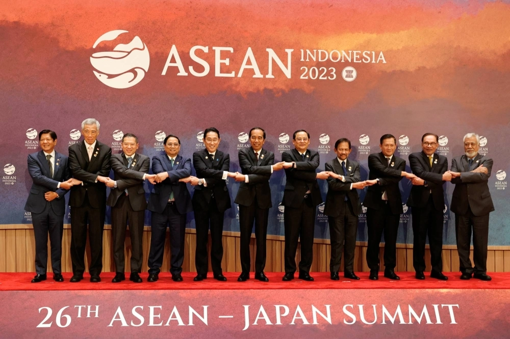 Prime Minster Fumio Kishida joins ASEAN leaders for a family photo before the start of the ASEAN-Japan summit in Jakarta in September. Prime Minster Fumio Kishida joins ASEAN leaders for a family photo before the start of the ASEAN-Japan summit in Jakarta in September.