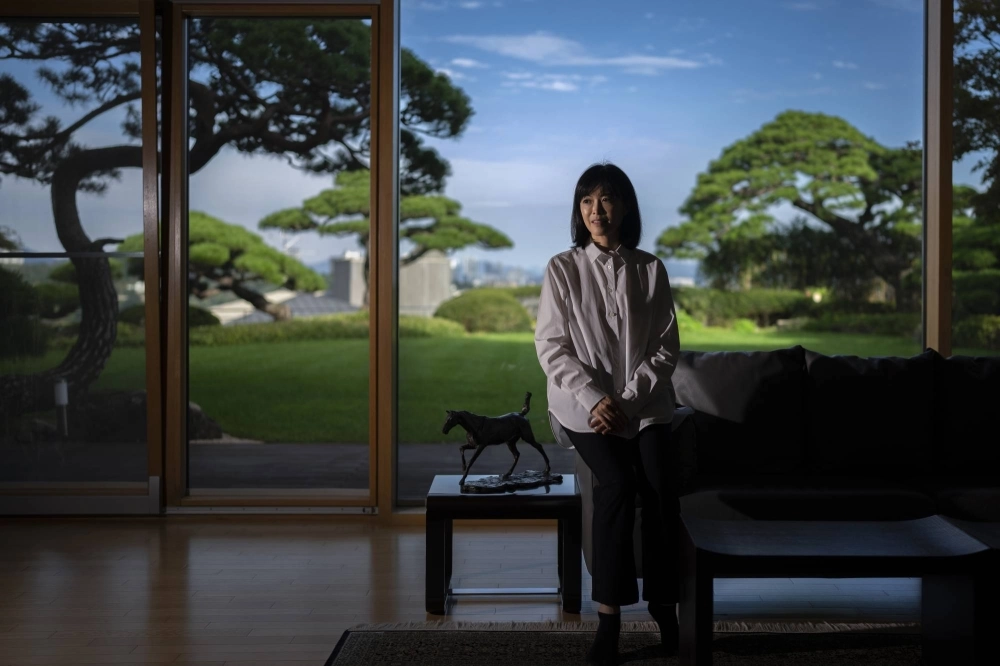 Koo Yeon-kyung, the eldest daughter of LG's former chairperson Koo Bon-moo, at her home in Seoul on Oct. 3. The death of Koo Bon-moo in 2018 without a will sparked a power struggle within the Koo family and LG over the inheritance of his estimated $1.5 billion fortune — including his 11% stake in the company. Koo Yeon-kyung, the eldest daughter of LG's former chairperson Koo Bon-moo, at her home in Seoul on Oct. 3. The death of Koo Bon-moo in 2018 without a will sparked a power struggle within the Koo family and LG over the inheritance of his estimated $1.5 billion fortune — including his 11% stake in the company.