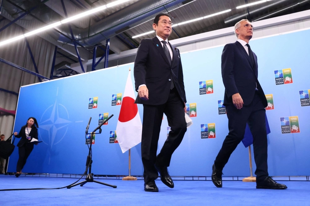 Prime Minister Fumio Kishida and NATO Secretary-General Jens Stoltenberg meet during a NATO summit in Vilnius, Lithuania, in July. Prime Minister Fumio Kishida and NATO Secretary-General Jens Stoltenberg meet during a NATO summit in Vilnius, Lithuania, in July.