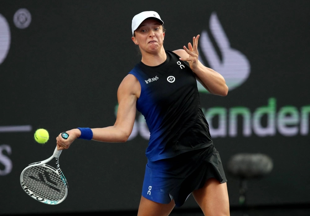 Poland's Iga Swiatek in action during the WTA Finals in Cancun, Mexico, in November.  Poland's Iga Swiatek in action during the WTA Finals in Cancun, Mexico, in November.