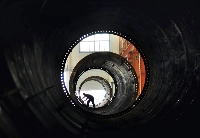 A worker builds the components of wind turbines at a factory in Zouping, China. | Reuters