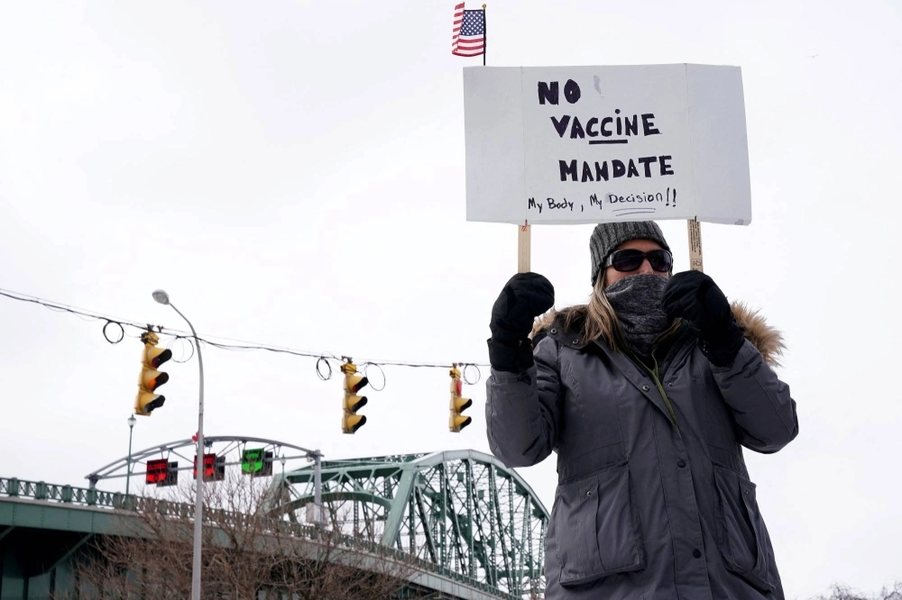 Demonstrators rally against COVID-19 vaccine mandates in Buffalo, New York, in February 2022. Demonstrators rally against COVID-19 vaccine mandates in Buffalo, New York, in February 2022.