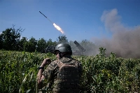 Ukrainian solider fire a missile toward enemy positions, in the Donetsk region of Ukraine on June 7. The Russia-Ukraine war is nearing its second anniversary with no end in sight. | Tyler Hicks/The New York Times