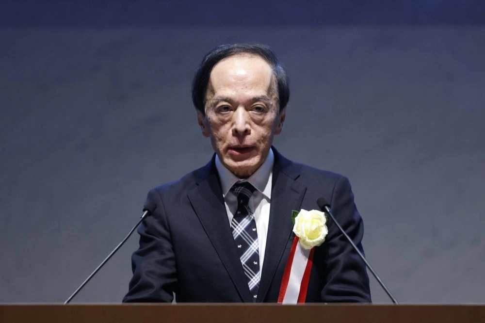 Bank of Japan Gov. Kazuo Ueda addresses a council meeting at business lobby Keidanren in Tokyo on Monday. Bank of Japan Gov. Kazuo Ueda addresses a council meeting at business lobby Keidanren in Tokyo on Monday.